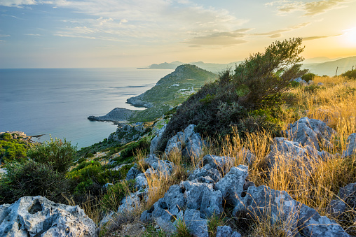 Sunset and coastal scenery on Profitis Ilias hill near Faliraki Rhodes Greece Europe