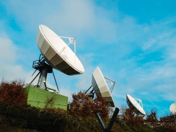 istock TV Satellites on a hill with a blue background 1192956484