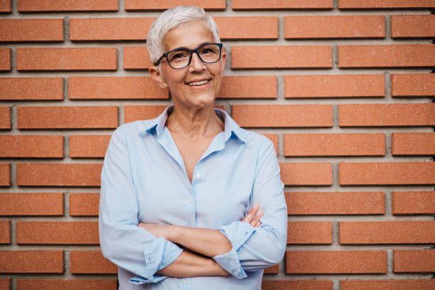 istock Active senior lady posing for business magazine 1192957544