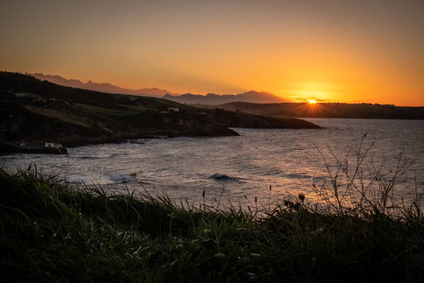 istock Comillas, Cantabria, northern Spain. Sunset over the ocean. 1192960765