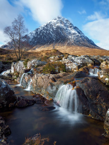 Buachaille Etive Mor and the tumbling waters of the river Coupall, Glencoe, Scotland.