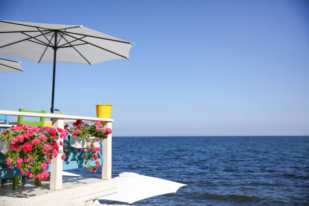 istock restaurant balcony with sea view 1192960848