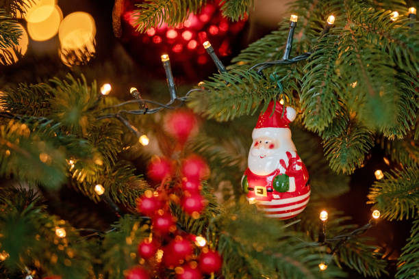 istock red Christmas holiday decorations with lights and garland 1192963109