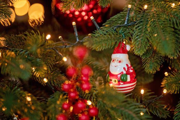 istock red Christmas holiday decorations with lights and garland 1192963113