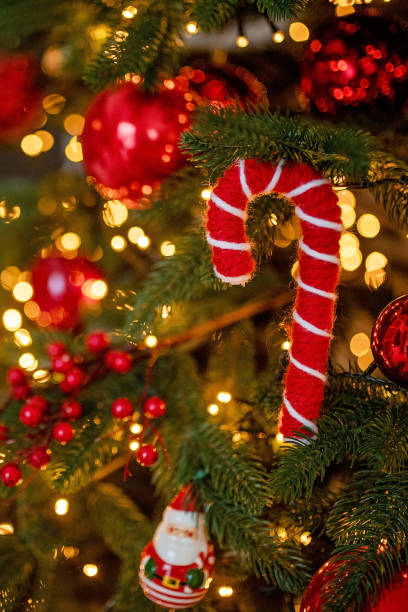 istock red Christmas holiday decorations with lights and garland 1192963134