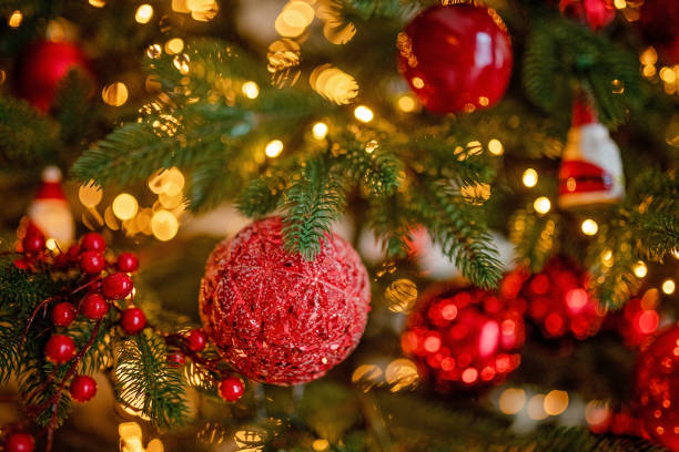 istock red Christmas holiday decorations with lights and garland 1192963147
