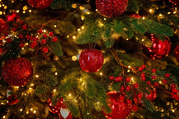 istock red Christmas holiday decorations with lights and garland 1192965017