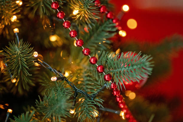 istock red Christmas holiday decorations with lights and garland 1192965358