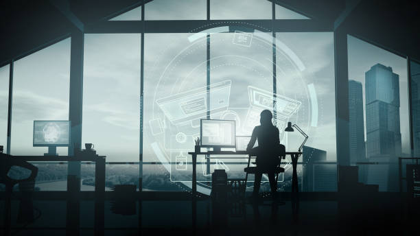 istock A woman web developer works on a background of infographics. 1192969294