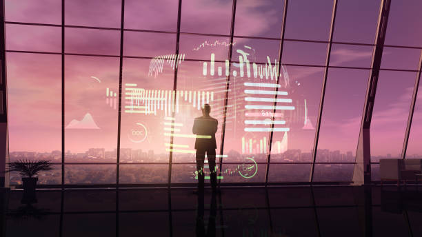 istock Businessman surrounded by a hologram of data. 1192970099