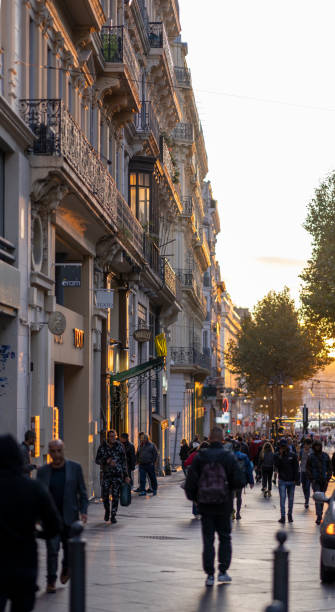 A narrow street in the Le Panier district of Marseille, France Cannes, France - November 3, 2019: A narrow street in the Le Panier district of Marseille, France marseille panier stock pictures, royalty-free photos & images