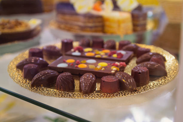 istock Delicious chocolate candy on display in candy store 1192977804