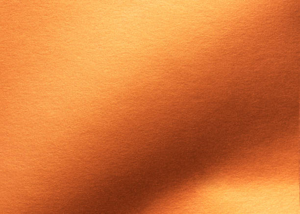 rame oro carta trama foglio di imballaggio metallico foglio sfondo arancione lucido per elemento decorazione carta da parati - carta argentata foto e immagini stock