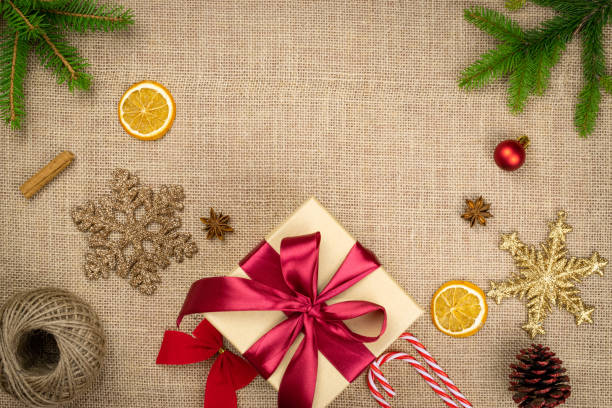 istock New Years Background. Christmas decoration isolated on linen texture. Xmas celebration pattern. Flat lay design. Copy Space 1192982136