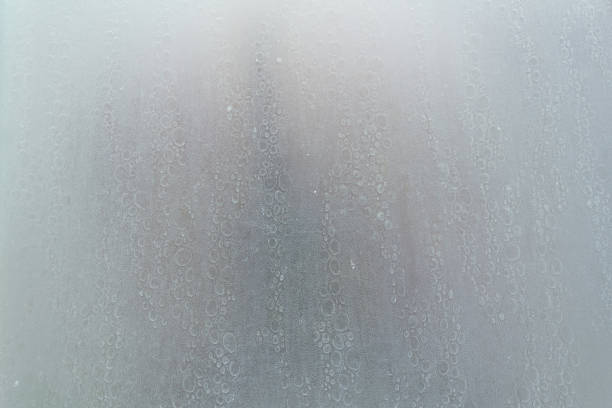 istock human body through a shower screen with drops on a light background 1192982282