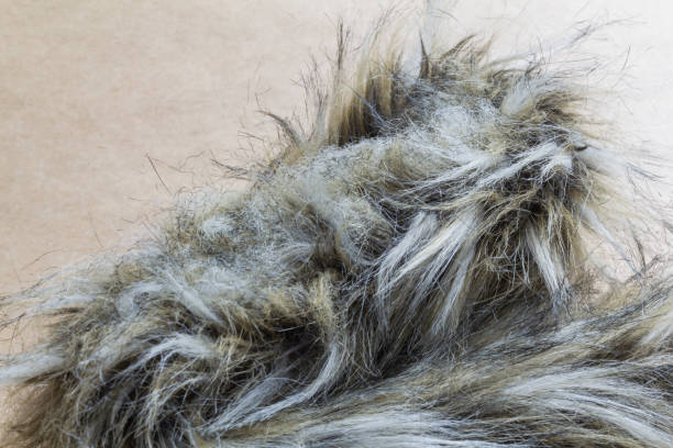 istock Wool, Fur dark light on a cardboard background 1192982497