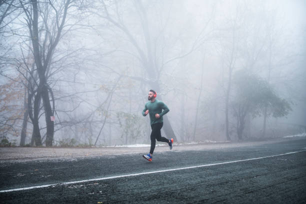 istock Man Running On The Road. 1192983320