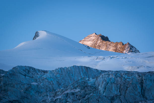 Sunrise near Cabane de Moiry in Swiss Alps. stock photo