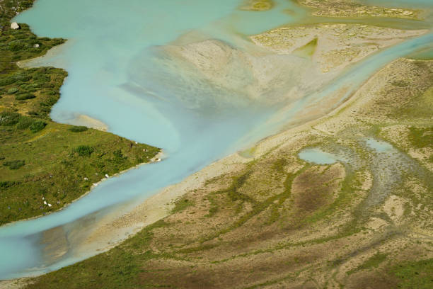 A close up photo showing a fragment of postglacial lake, seen from above. stock photo