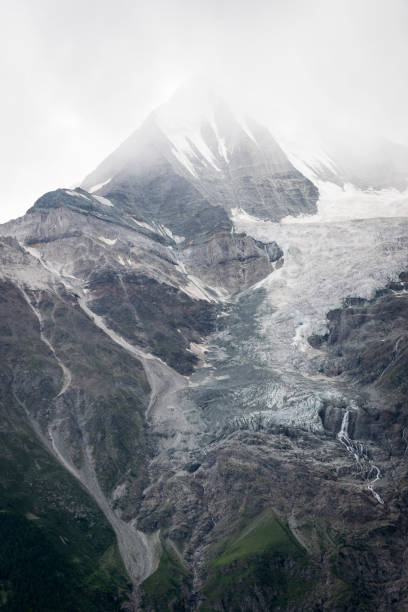 Bleak, cold, almost monochromatic alpine landscape. stock photo