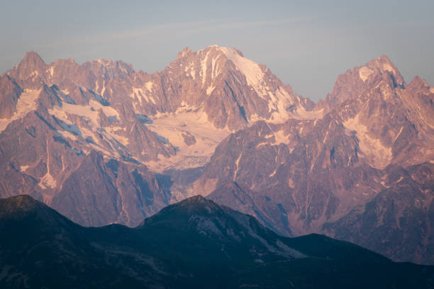 A fragment of Mont Blanc massif, seen at the sunrise from Cabane Mont Fort in Swiss Alps. stock photo