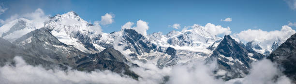 Hi-res panoramic view of majestic Weisshorn, seen from Col de Sorebois in Swiss Alps. stock photo