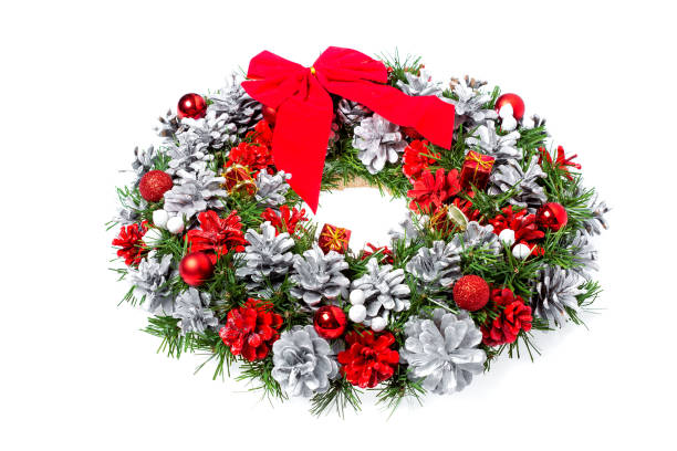 istock Christmas wreath with cones, New Year's multicolor decor isolated on white background. 1192994436
