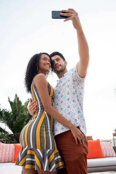 istock Wedding couple taking a selfie 1192999729
