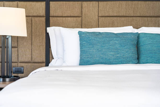 istock White comfortable pillow on bed decoration interior 1193004751