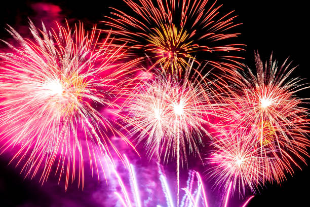 istock Beautiful colorful firework display at night for celebrate 1193005944