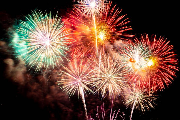 istock Beautiful colorful firework display at night for celebrate 1193006011