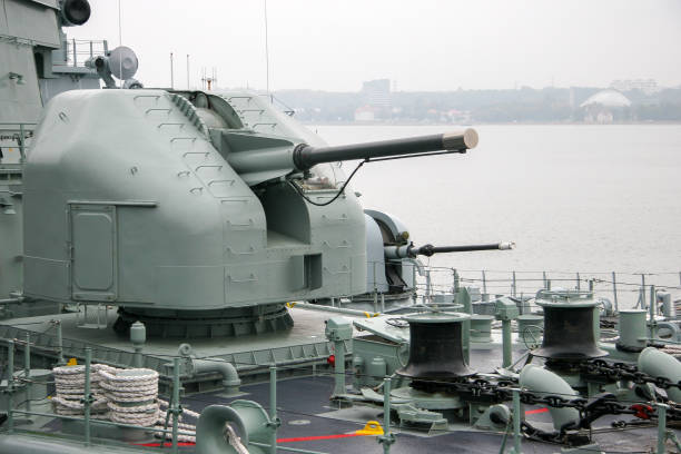 istock Ship gun with a hatch and a compartment for a man on a ship with a closed barrel. 1193011795