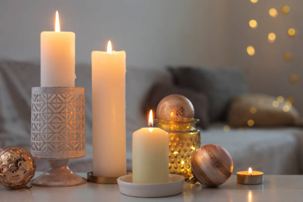 istock Christmas decorations with candles at home 1193012878