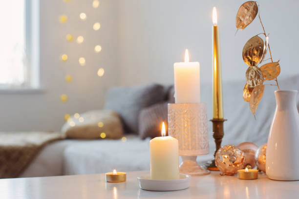 istock Christmas decorations with candles at home 1193012885