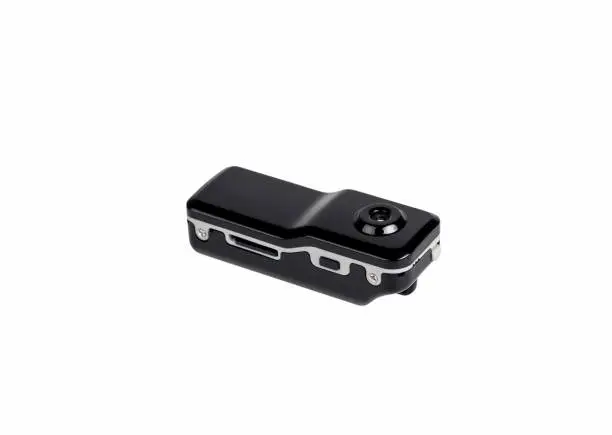Small black action camera, video recorder. Isolated on white background.