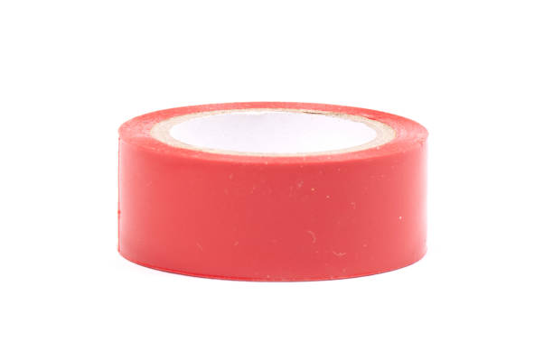 istock Roll of red insulation tape isolated on white background 1193027197