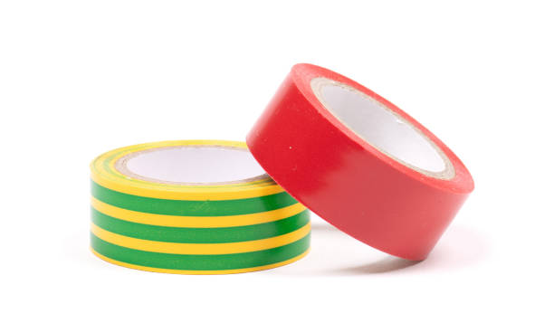 istock Roll of yellow and red insulation tape isolated on white background 1193027219