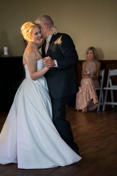 istock Father and daughter dance at wedding 1193028478