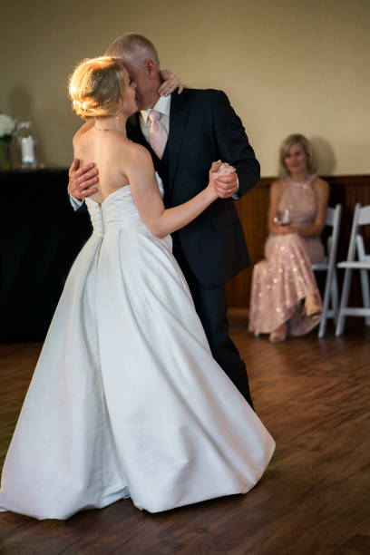 istock Father and daughter dance at wedding 1193028486