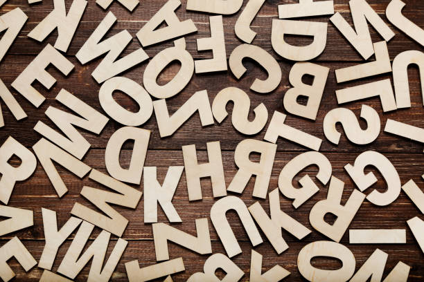 istock Wooden letters on brown table 1193032691