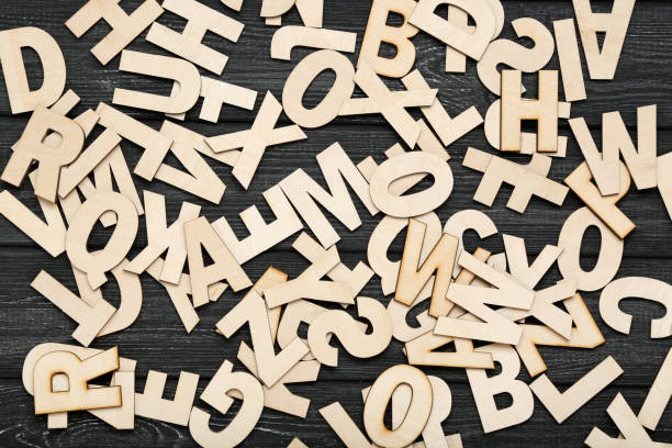 istock Wooden letters on black table 1193032840