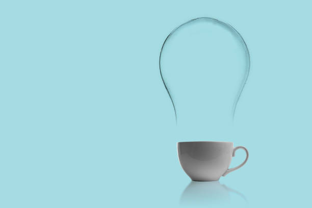 istock a simple cup with a light bulb shape steam, a fresh  hot energy  coffee drink concept 1193033519