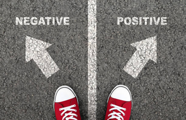 Negative or positive thinking is a personal choice Negative And Positive Thinking. Optimism or pessimism is a personal choice. Friendly or aggressive attitude pessimism photos stock pictures, royalty-free photos & images