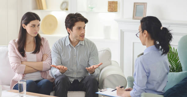 istock Angry man complaining about his wife at familly session 1193035879
