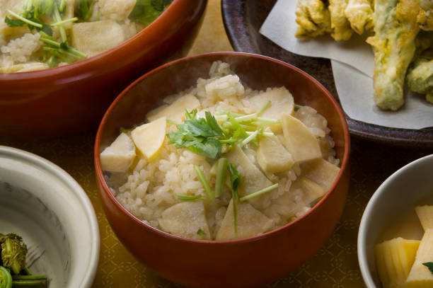 Bamboo shoot rice Spring dish Bamboo shoot rice is a dish cooked with bamboo shoots on rice. In Japan, we eat bamboo shoots as vegetables during the spring season. Bamboo shoot rice is one of popular eating methods for bamboo shoots. zanthoxylum stock pictures, royalty-free photos & images