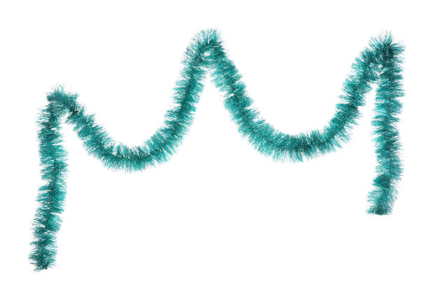 istock Christmas tinsel hanging on white background 1193038451