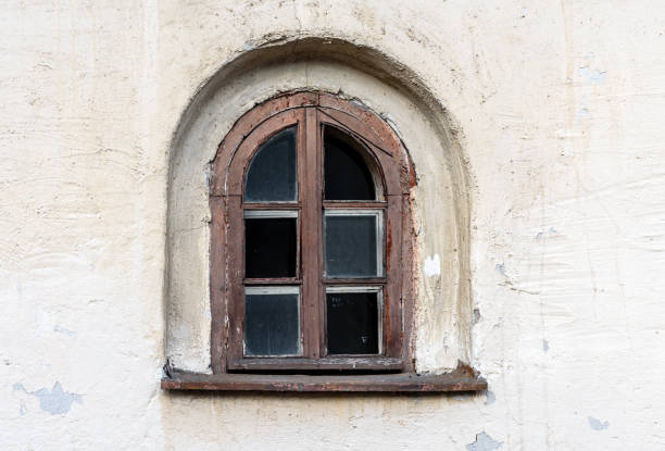istock Window on the wall of an ancient building 1193038585