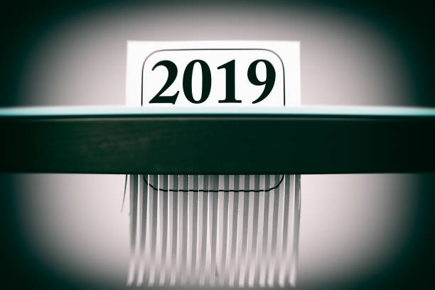 istock Destroying the Year 2019 in a Paper Shredder 1193042669