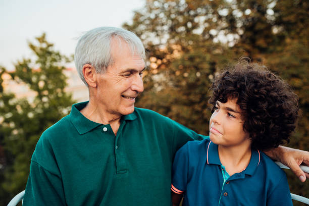 istock Boy enjoying with his grandpa 1193042914