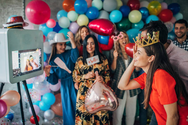 istock People photographing at the party 1193045241